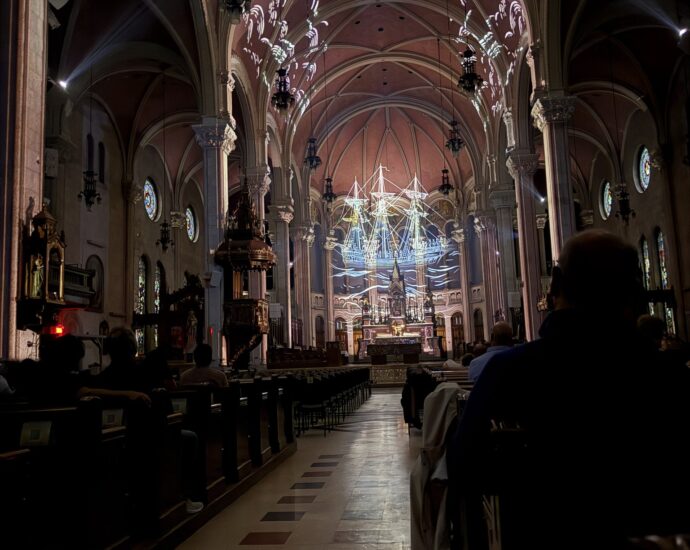 AURA light projections illuminating the interior of Saint-Roch Church in Quebec City