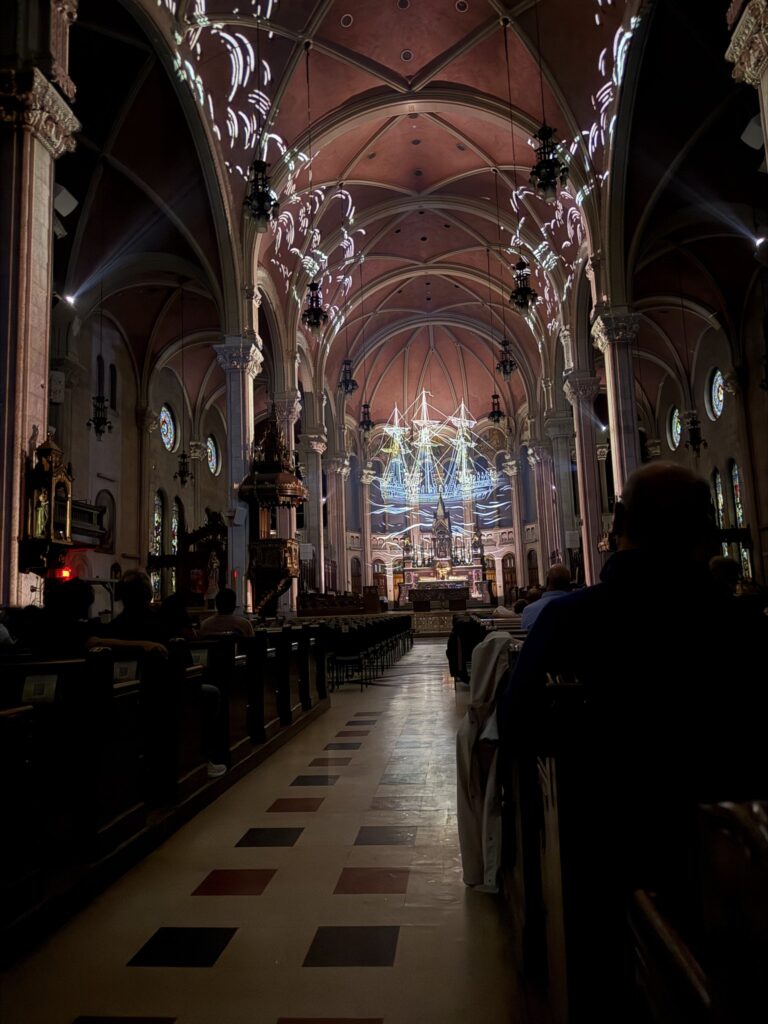 AURA light projections illuminating the interior of Saint-Roch Church in Quebec City