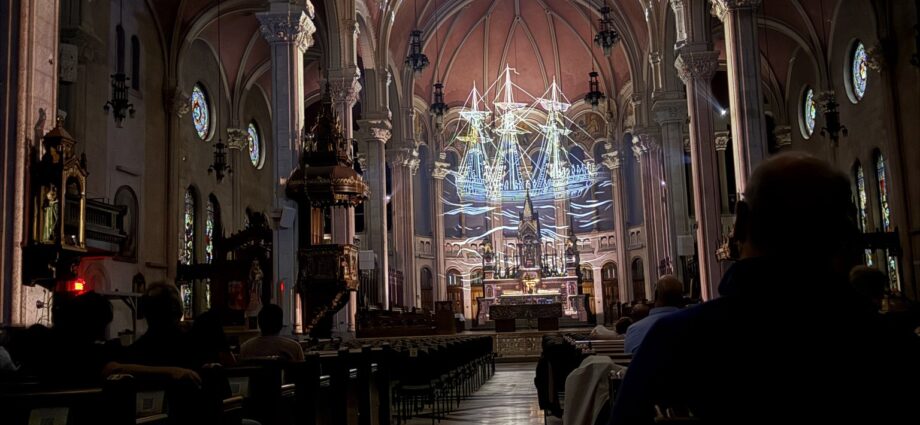 AURA light projections illuminating the interior of Saint-Roch Church in Quebec City