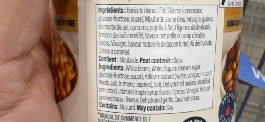 Clark The Canadian baked beans with maple and bacon flavours can showing the ingredient label
