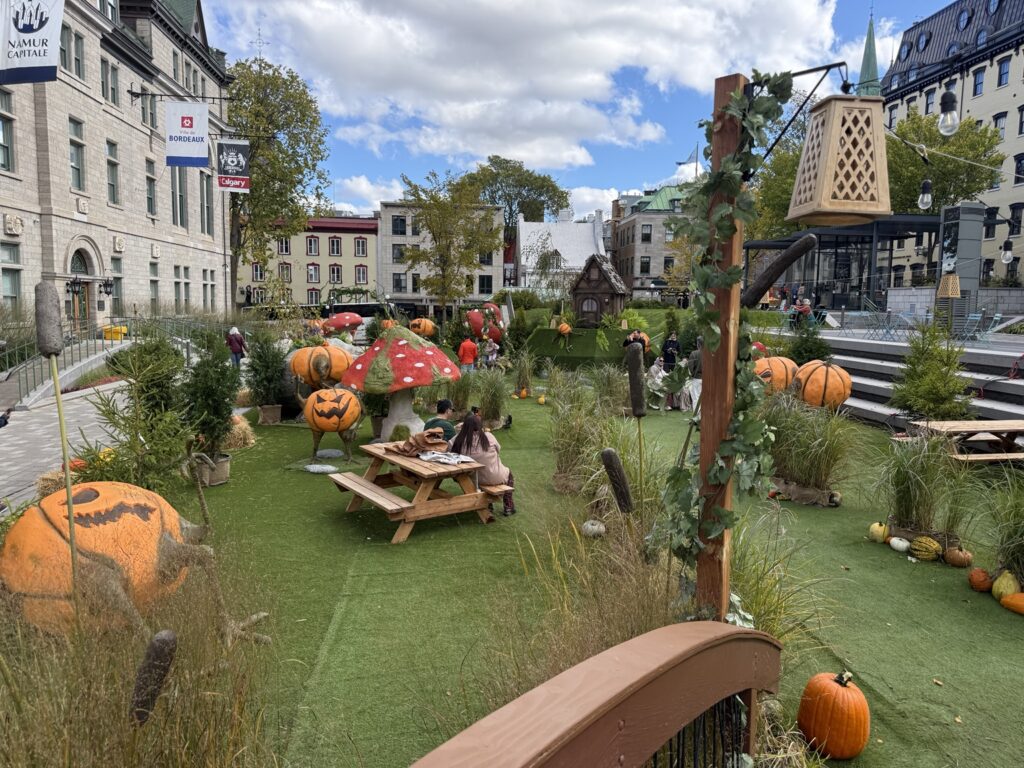 Giant pumpkins, mushrooms and Halloween decorations in the Jardins de l'Hôtel-de-Ville in Old Quebec