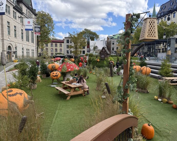Giant pumpkins, mushrooms and Halloween decorations in the Jardins de l'Hôtel-de-Ville in Old Quebec