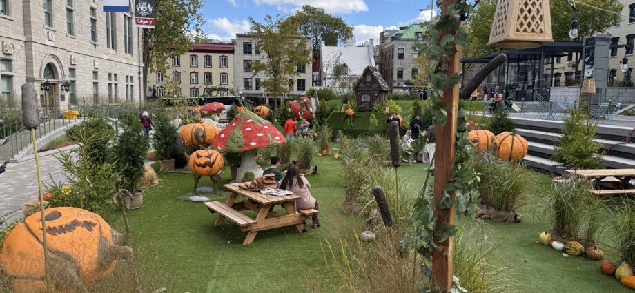 Giant pumpkins, mushrooms and Halloween decorations in the Jardins de l'Hôtel-de-Ville in Old Quebec