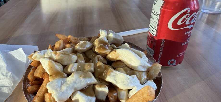 Poutine topped with fresh cheese curds at Fromagerie Victoria in Victoriaville
