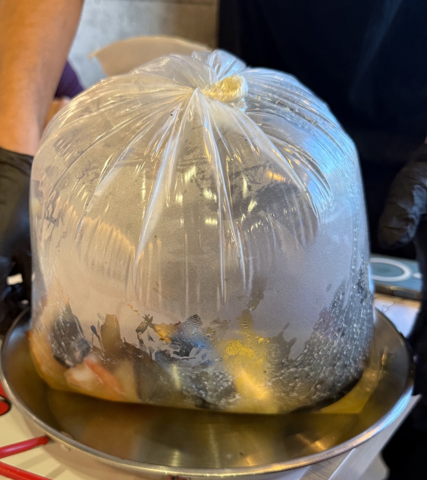 Seafood boil bag served at Seau de Crabe in Charlesbourg, Quebec City